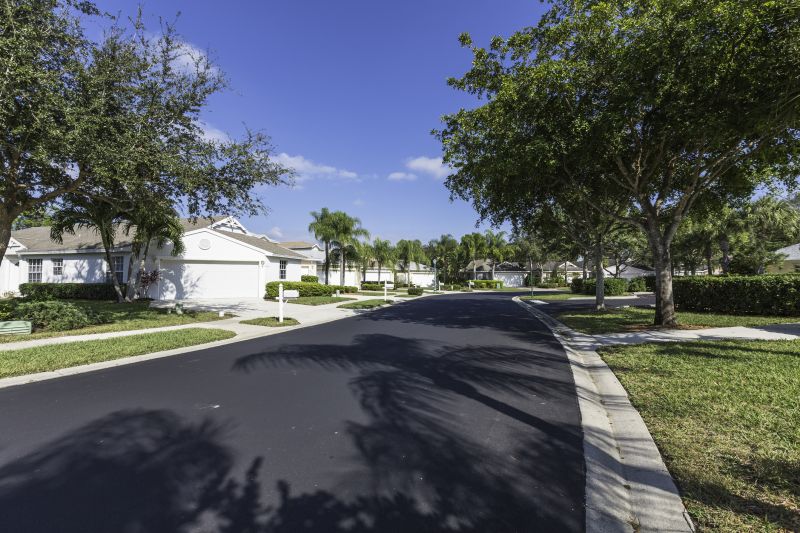 Residential Asphalt Driveway with Landscaping